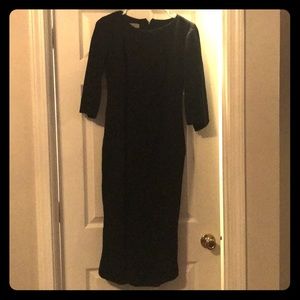 Midi length black dress